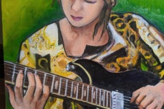 ギターを弾く自画像